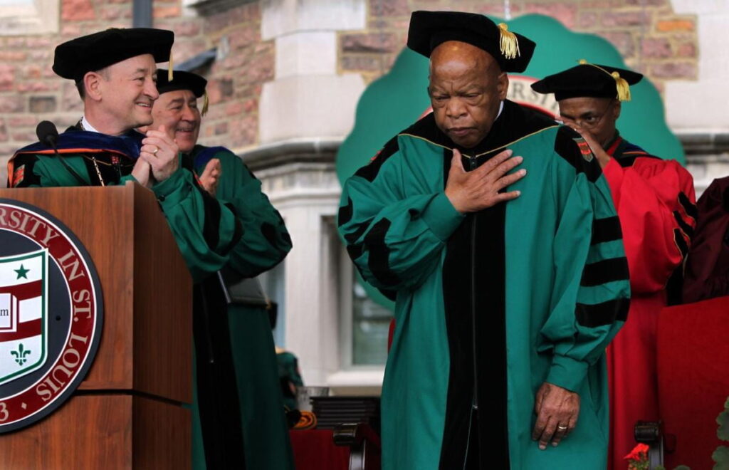 John Lewis accepts honorary degree.