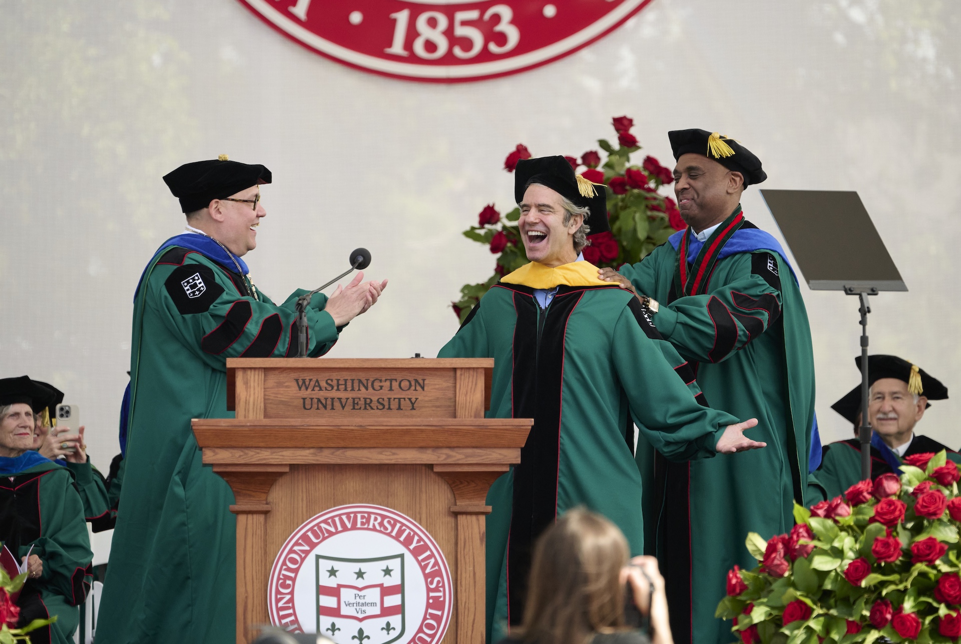 (l to r) Chancellor Andrew D. Martin, Andy Cohen, Commencement Keynote Speaker, Grand Marshal Dwight McBride